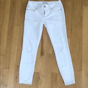 White distressed denim with ankle fray